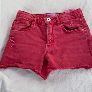 Girls red frayed denim shorts